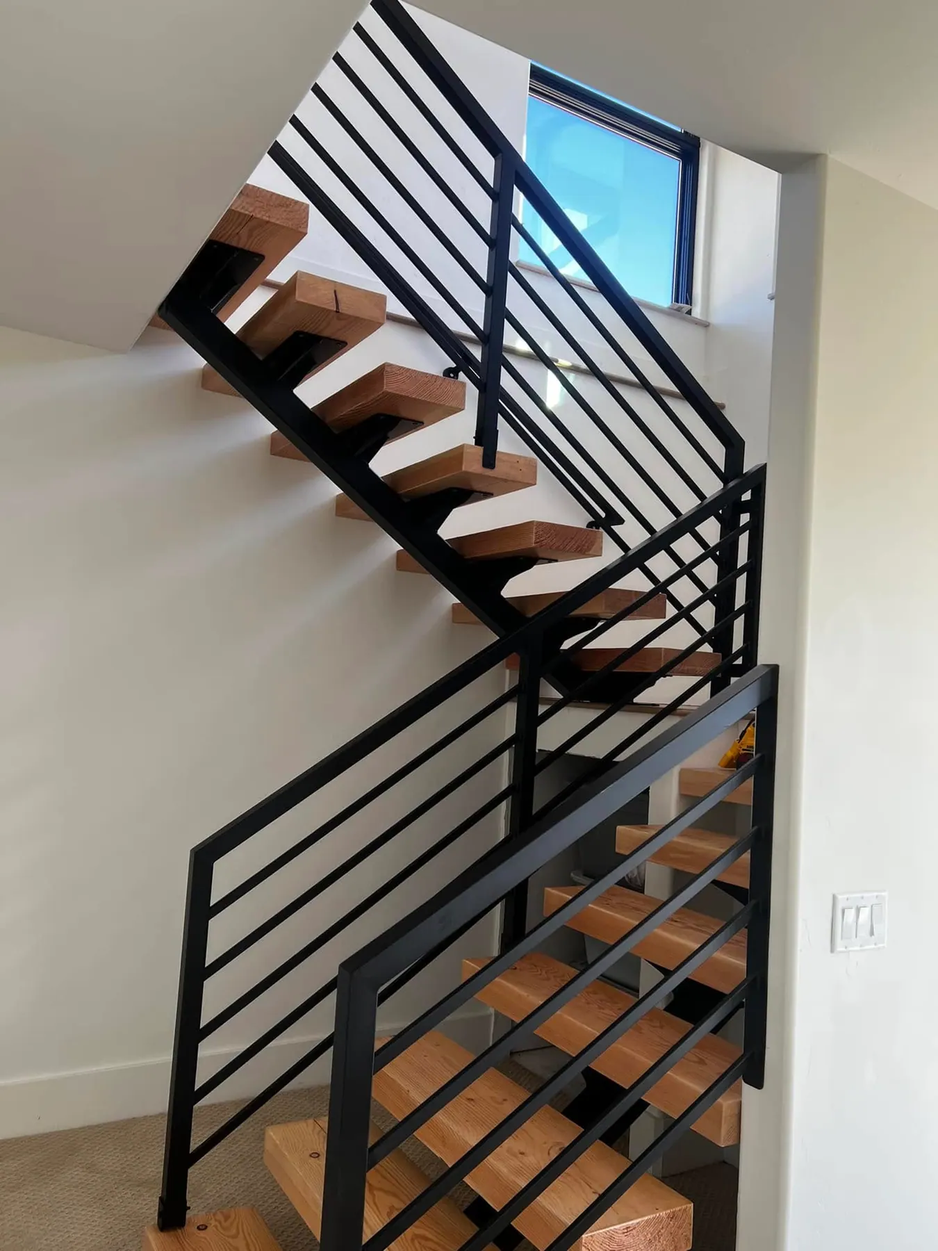 Modern Floating Staircase by B & K Metal Works